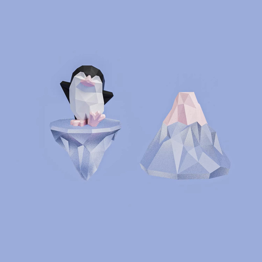 Mismatched Arctic Drift earrings featuring a geometric penguin standing on a floating iceberg and a separate faceted iceberg charm, worn on silver hooks.
