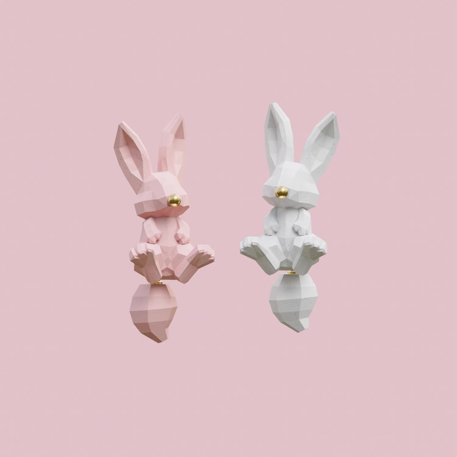 Geometric bunny stud earrings in blush pink and white with gold nose detail on a soft pink background