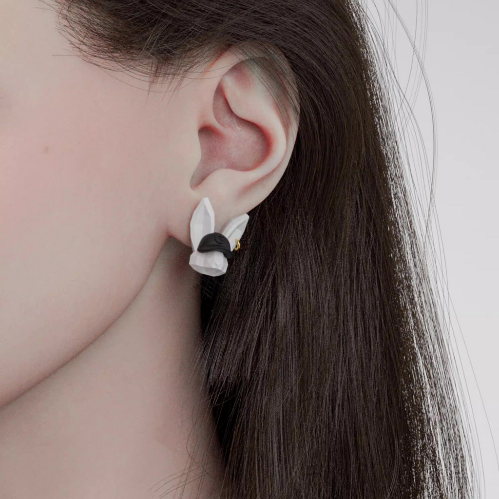 Handmade fox and bunny character earrings with sunglasses and cap, cute statement jewelry on a white background.
