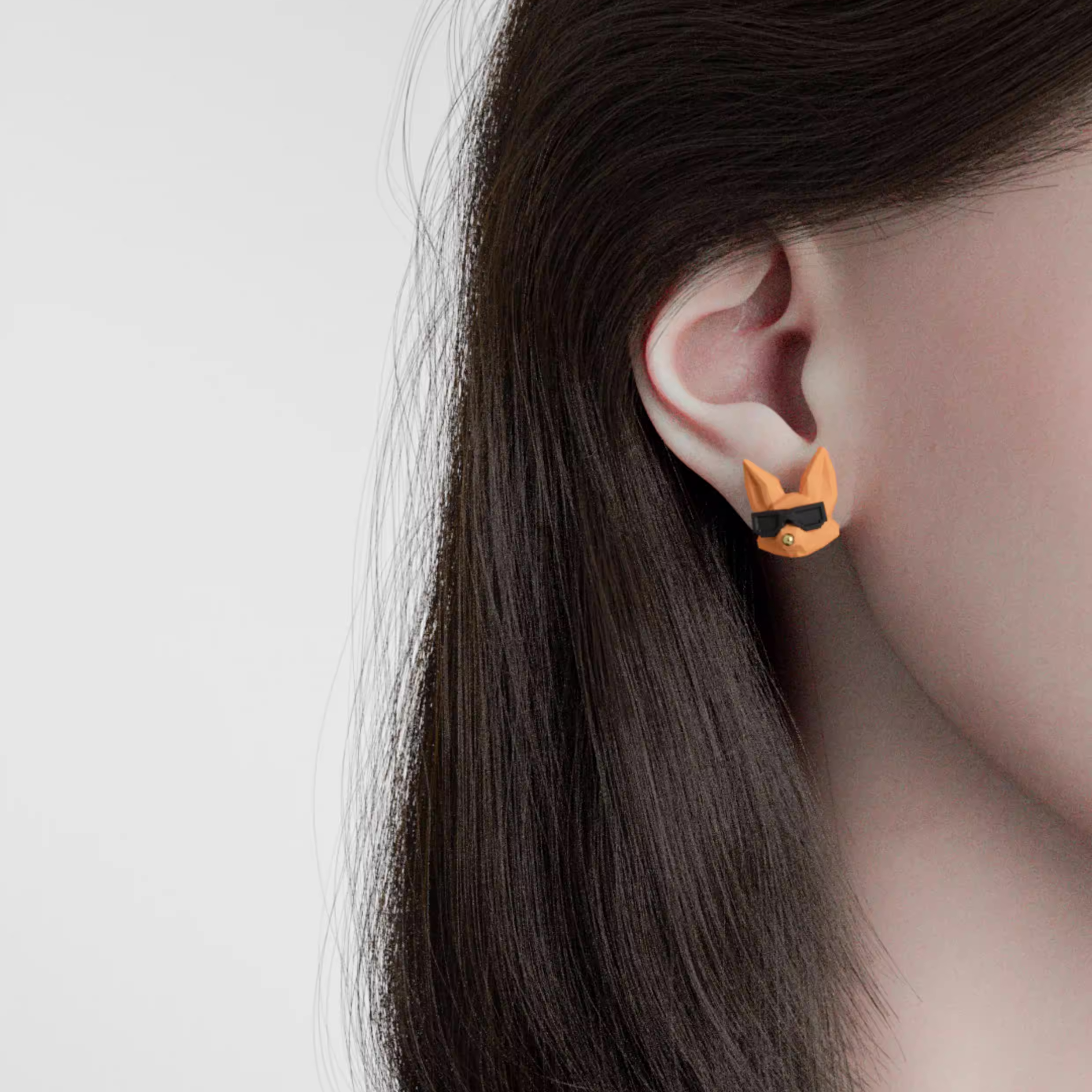 Handmade fox and bunny character earrings with sunglasses and cap, cute statement jewelry on a white background.