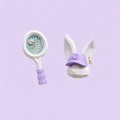 Cute bunny character jewelry featuring a white bunny wearing a lavender cap and holding a tennis racket, handmade pastel earrings and necklace with a playful, whimsical design.