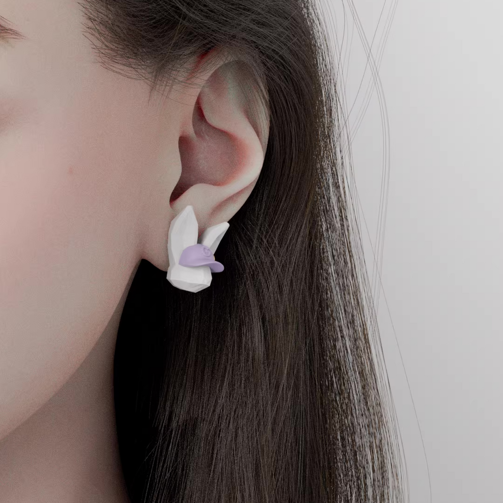Cute bunny character jewelry featuring a white bunny wearing a lavender cap and holding a tennis racket, handmade pastel earrings and necklace with a playful, whimsical design.