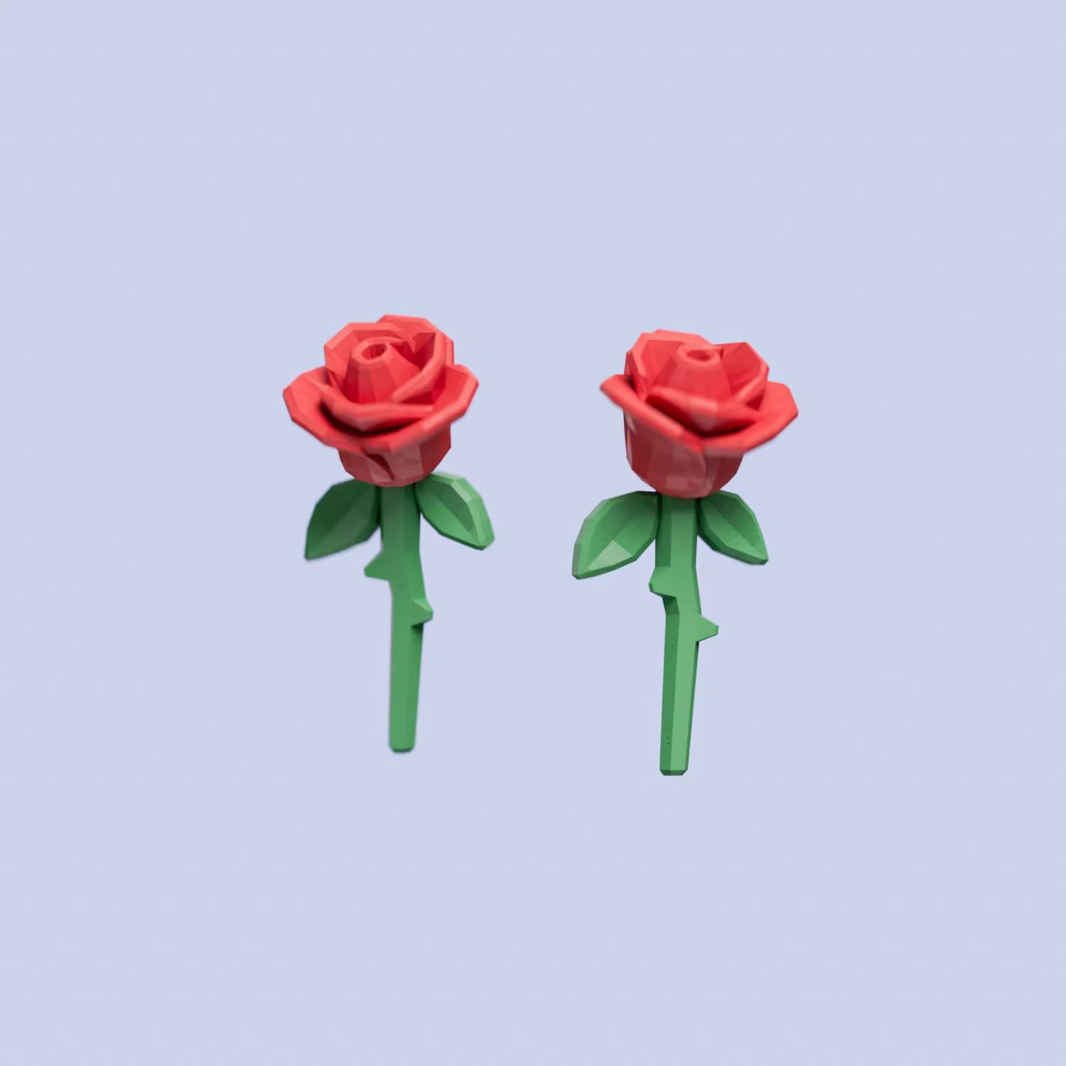 Handmade rose stud earrings featuring sculpted acrylic roses with green stems, lightweight pastel floral jewelry on a soft background.