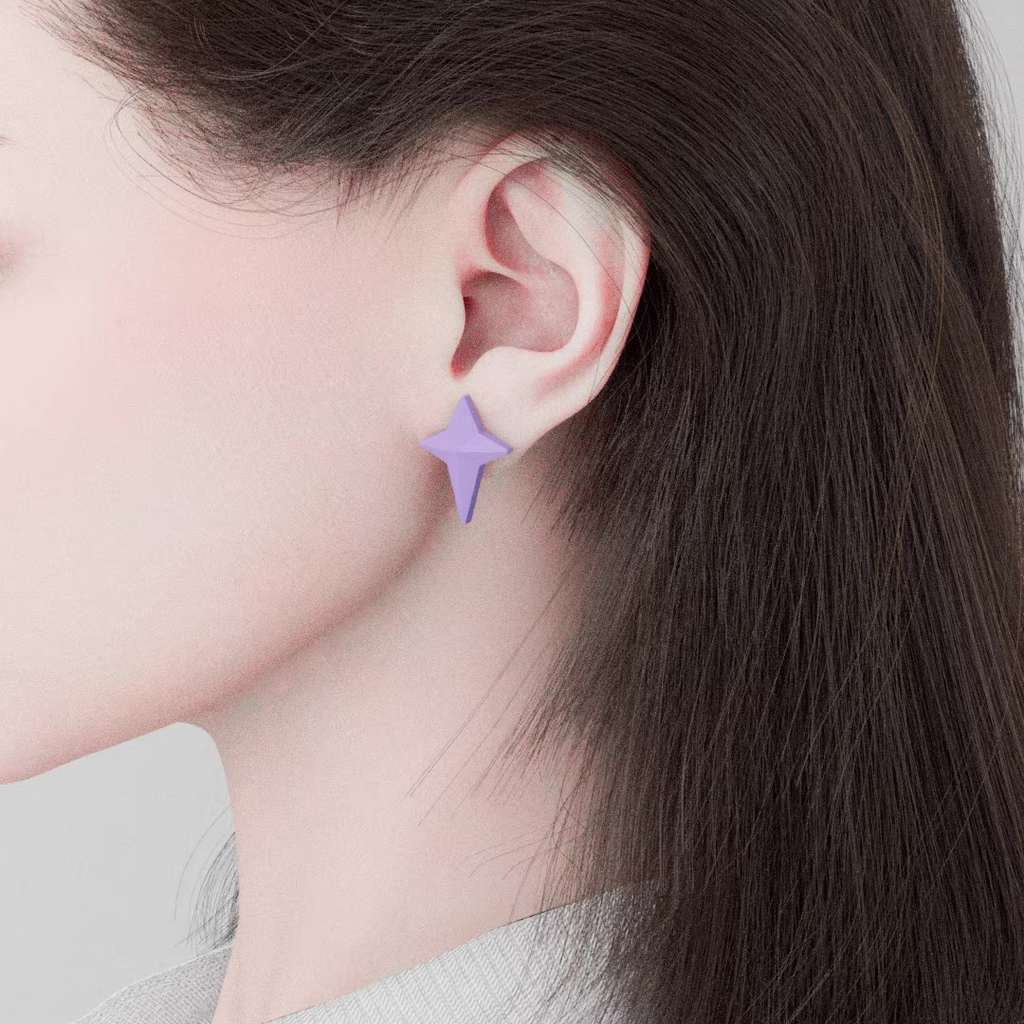 Pastel star stud earrings in soft pink and lavender colors, handmade acrylic jewelry worn on ear, minimalist kawaii style