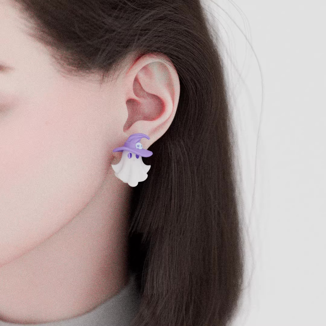 Pastel ghost earrings with lavender bow and witch hat details, handmade acrylic spooky cute jewelry on light purple background